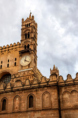 Fototapeta na wymiar Clock tower of famous Palermo Cathedral in Palermo, Italy