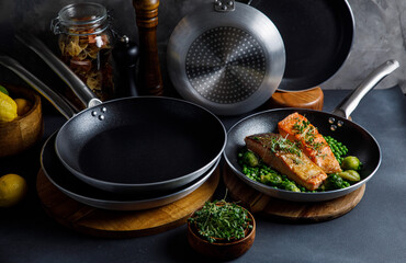 Steel frying pans in the kitchen