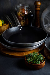 Steel frying pans in the kitchen