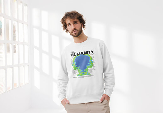 Mockup of man with beard wearing customizable sweatshirt in studio