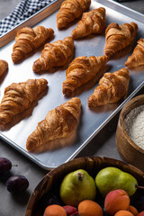 Container with croissants in the kitchen