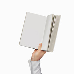  hand holds a opened book in hardcover on free white Background