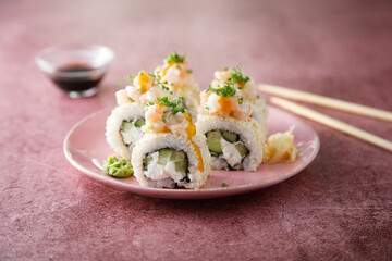 Shrimp sushi rolls with mango sauce