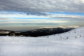 Fototapeta na wymiar View of winter mountain landscape with beautiful sky