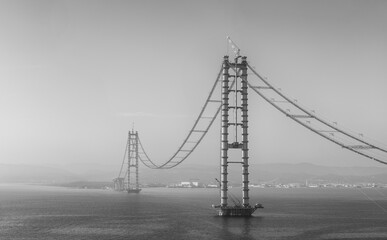Osman Gazi Bridge (Izmit Bay Bridge). Izmit, Kocaeli, Turkey. Construction of a new road bridge continues across the Marmara Sea.