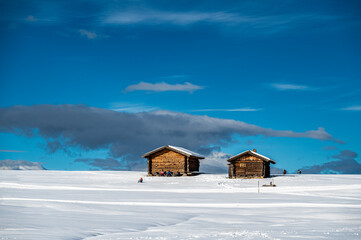 The largest high altitude plateau in Europe in winter. Snow and winter atmosphere on the Alpe di Siusi. Dolomites.