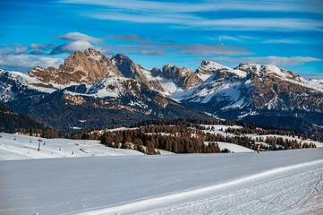 The largest high altitude plateau in Europe in winter. Snow and winter atmosphere on the Alpe di Siusi. Dolomites.