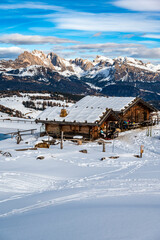 The largest high altitude plateau in Europe in winter. Snow and winter atmosphere on the Alpe di Siusi. Dolomites.