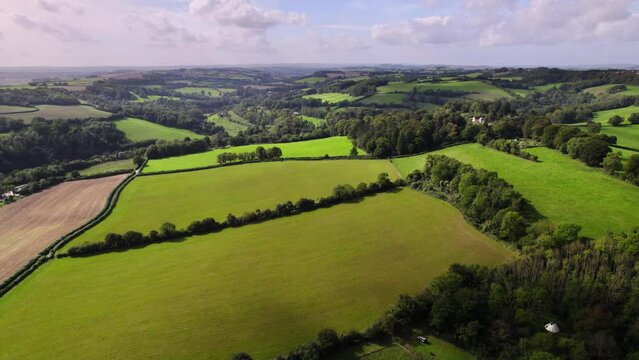 Aerial shot flying over rural English countryside near Bath, UK