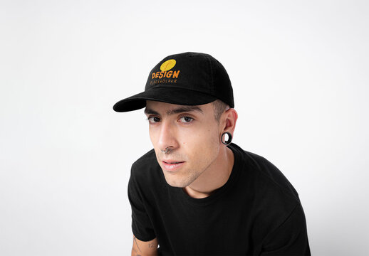 Mockup of man wearing customizable baseball cap with piercings