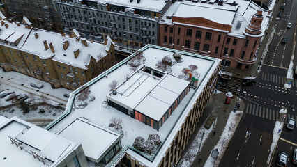 Drone point of view of a restaurant on a rooftop during winter