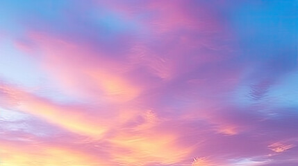 Obraz premium Light pink clouds in sunset blue sky. Pastel colors of clouds, sunrise sundown natural background