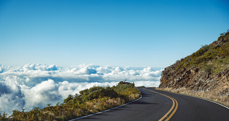 Hawaiian pass road above the clouds and to the skies, On the way to Haleakala Crater, Maui Hawaii