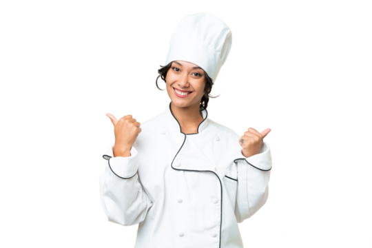 Young chef Argentinian woman over isolated background with thumbs up gesture and smiling
