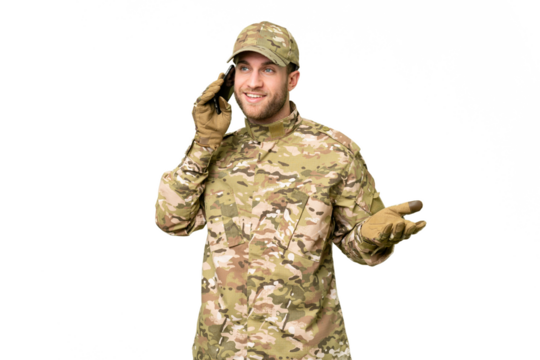 Military man over isolated chroma key background keeping a conversation with the mobile phone with someone