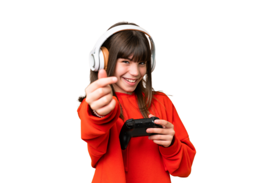 Little caucasian girl playing with a video game controller over isolated background making money gesture