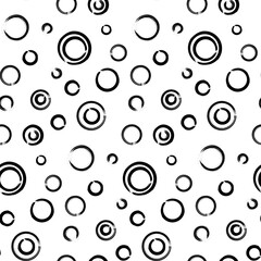 Grunge Bubbles seamless pattern with hand drawn circles. Ornament for printing on fabric, cover and packaging. Simple black and white vector ornament isolated on white background