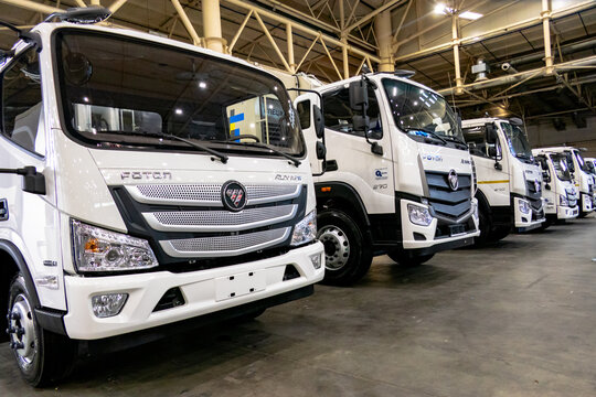 KIEV, Ukraine - October 07,2023:Medium-duty trucks from the Chinese company Beiqi Foton Motor stand in a row.