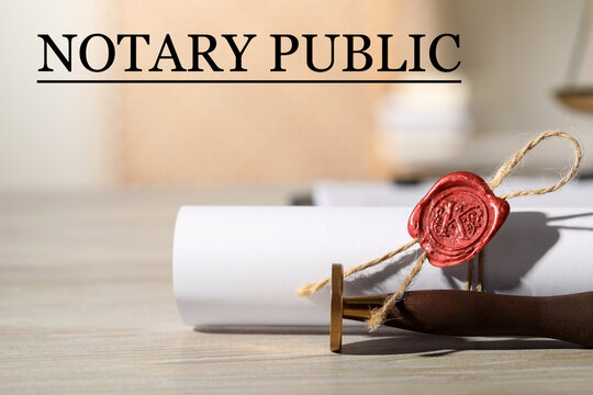 Public notary. Document with wax stamp on wooden table, closeup