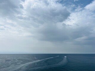 Dark clouds at the sea, sea horizon