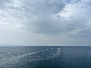 Dark clouds at the sea, sea horizon