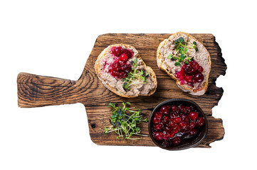 Duck rillettes pate toasts with sprouts on a wooden board.  Transparent background. Isolated.