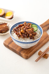 Braised pork belly meat over cooked rice, famous and delicious street food in Taiwanese restaurant.