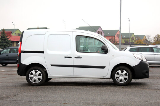 Vinnytsia, Ukraine; November 08, 2023. White Renault Kangoo Cargo Van at the city street. Renault Kangoo Rapid Express at the parking. Cargo delivery vehicle. Right side view.
