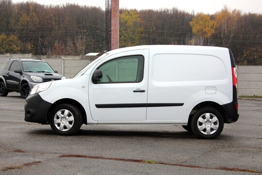 Vinnytsia, Ukraine; November 08, 2023. White Renault Kangoo Cargo Van at the city street. Renault Kangoo Rapid Express at the parking. Cargo delivery vehicle. Left side view.