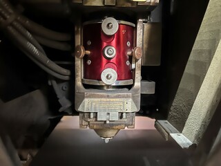 close-up of the lens and nozzle of a laser cutting machine. metalworking industry