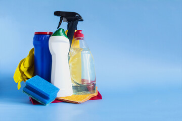 A set of household chemicals to maintain cleanliness in the house in close-up on a light background