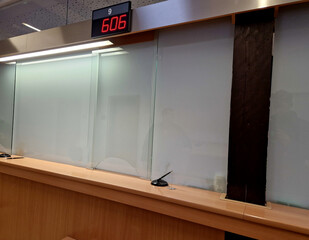 you will come to an office room with partitions made of opaque glass. is closed, closes the blinds....
