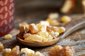 Close up of frankincense resin on a spoon