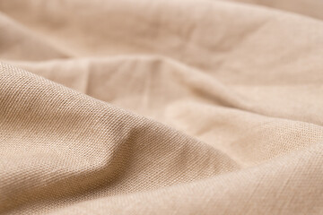 Natural linen fabric texture. Rough crumpled burlap background. Selective focus