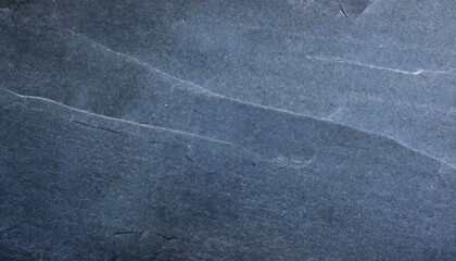 The background has a rough, dark gray stone surface.