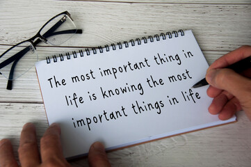 Inspirational quote text - The most important thing in life is knowing the most important things in...