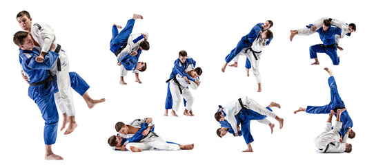 Two men in kimono, judo, taekwondo, karate athletes fighting isolated over white background....