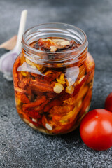 Sun-dried tomatoes. Homemade preparations for the winter, Italian cuisine.