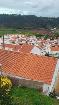 Praia De Odeceixe Mar Windmill, Faro district, Algarve, Portugal. Rota Vicentina Coast, Odemira, Portugal. Hiking Rota Vicentina the Fisherman's Trail