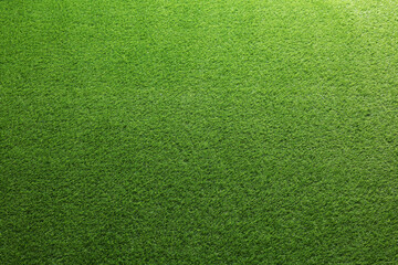 Green artificial grass as background, top view - obrazy, fototapety, plakaty