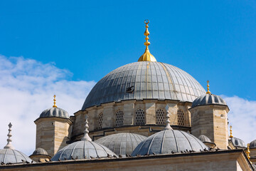Fototapeta na wymiar Mosque background photo. Eminonu Yeni Cami or New Mosque's domes