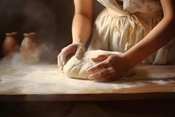 Poster Woman's hands rolling the dough. Bread baking concept photo © Oksana