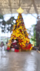 A backdrop setting the scene for Christmas with abstract bokeh lighting.