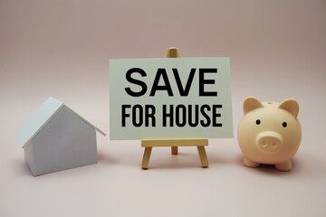 Save for House text message with house and piggy bank on pink background, business and invest...