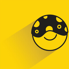 donut with shadow on yellow background