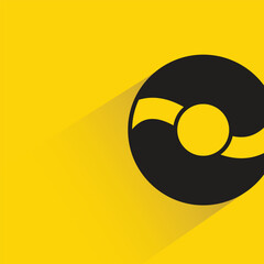 donut with shadow on yellow background