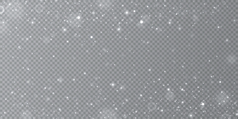 Particles of white magic dust. Shining light particles.Christmas glitter particles. Light effect on a transparent background	