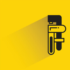 adjustable wrench icon with shadow on yellow background