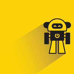 cute robot with shadow on yellow background