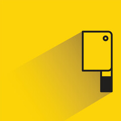 chopping knife icon with shadow on yellow background